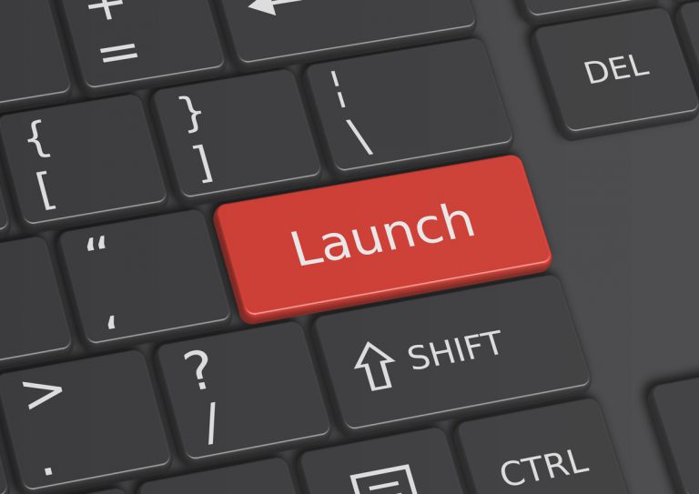 A 3D illustration of the word Launch written on the keyboard | Launch